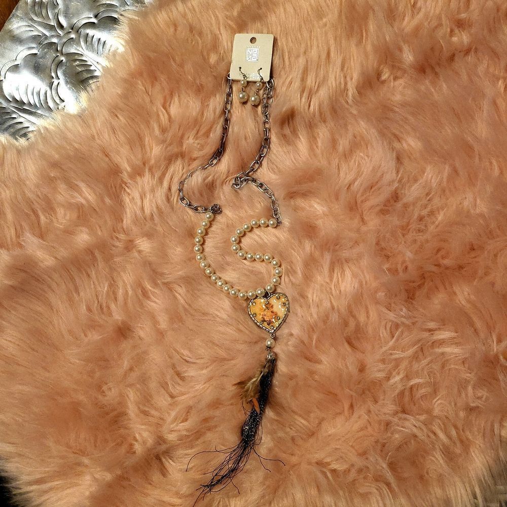A set of earrings and a necklace,  very nostalgic and boots, brand new!